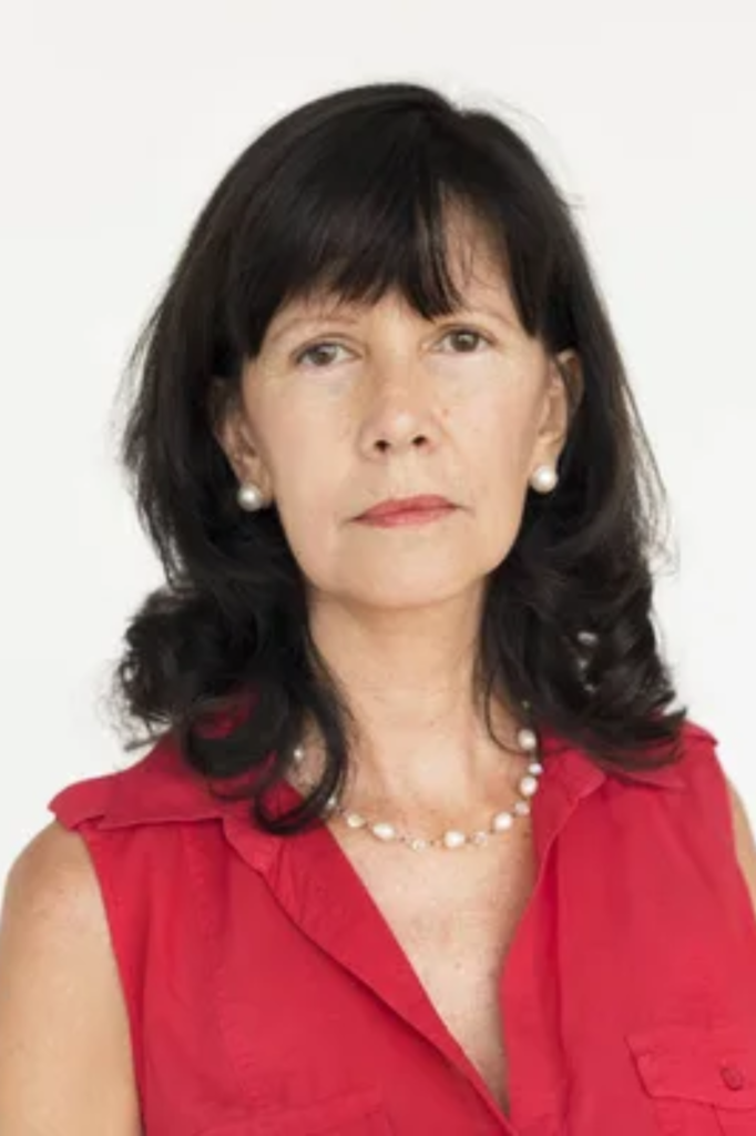 Inspiration for Mrs. Beaumont, a dark haired woman in about her 60s